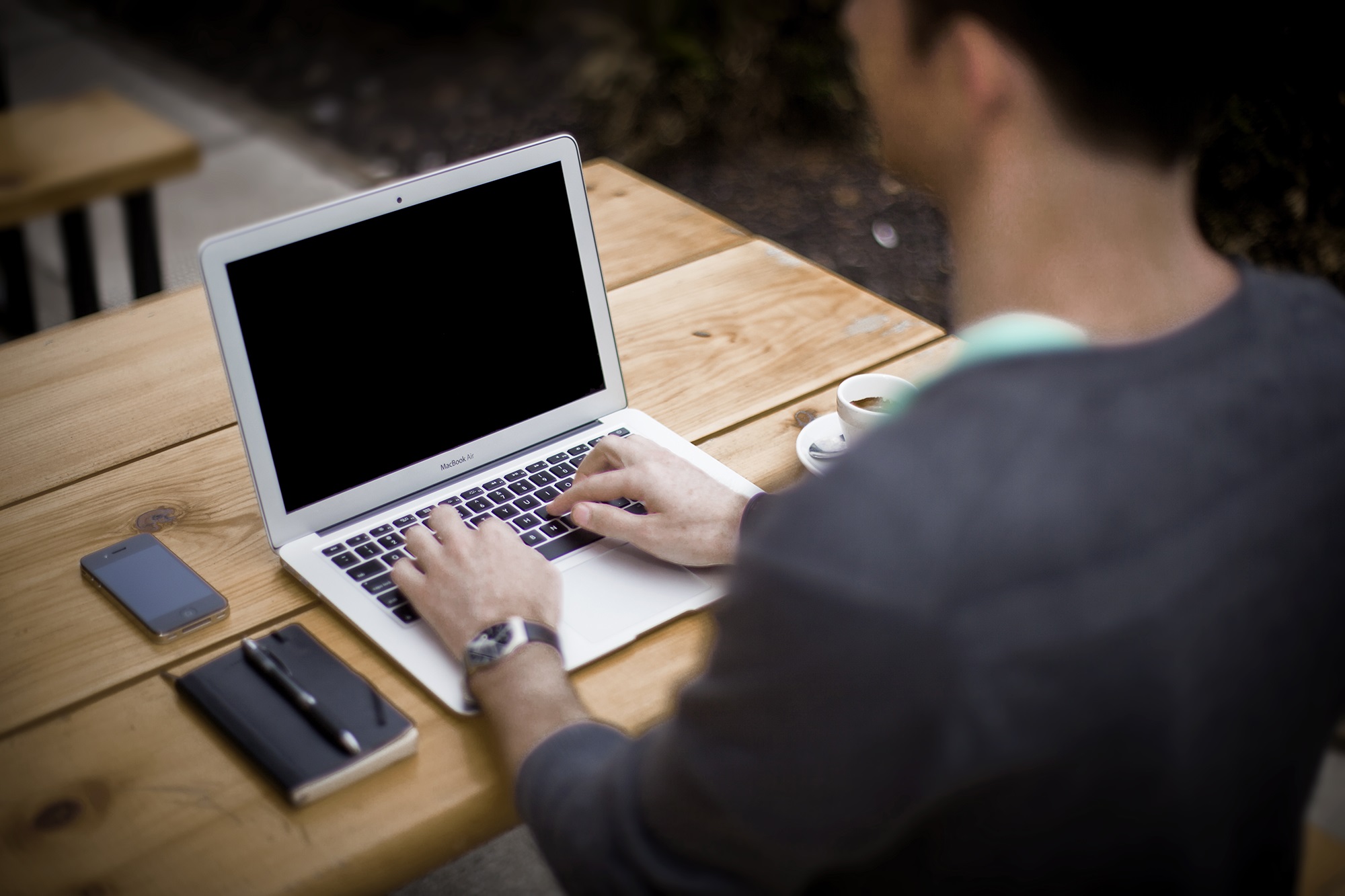 Foto van man met laptop