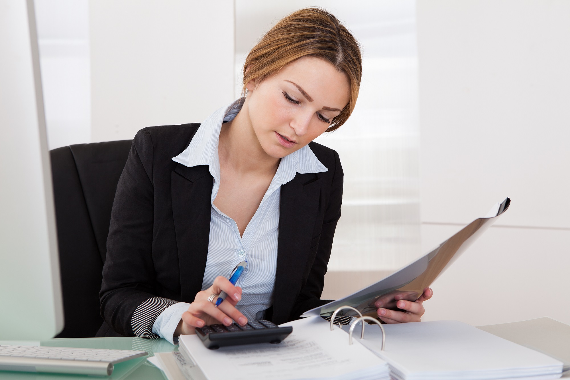 Picture of woman doing calculations