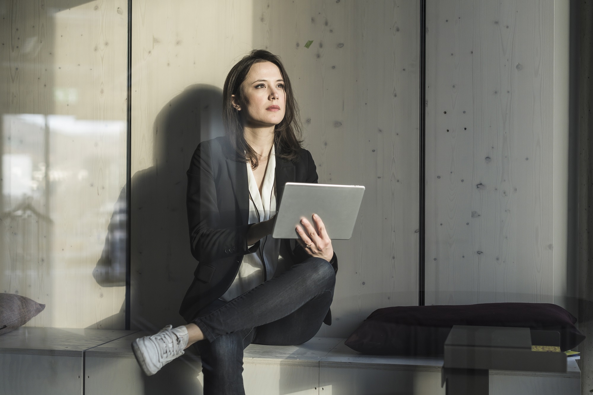 photo of woman with tablet